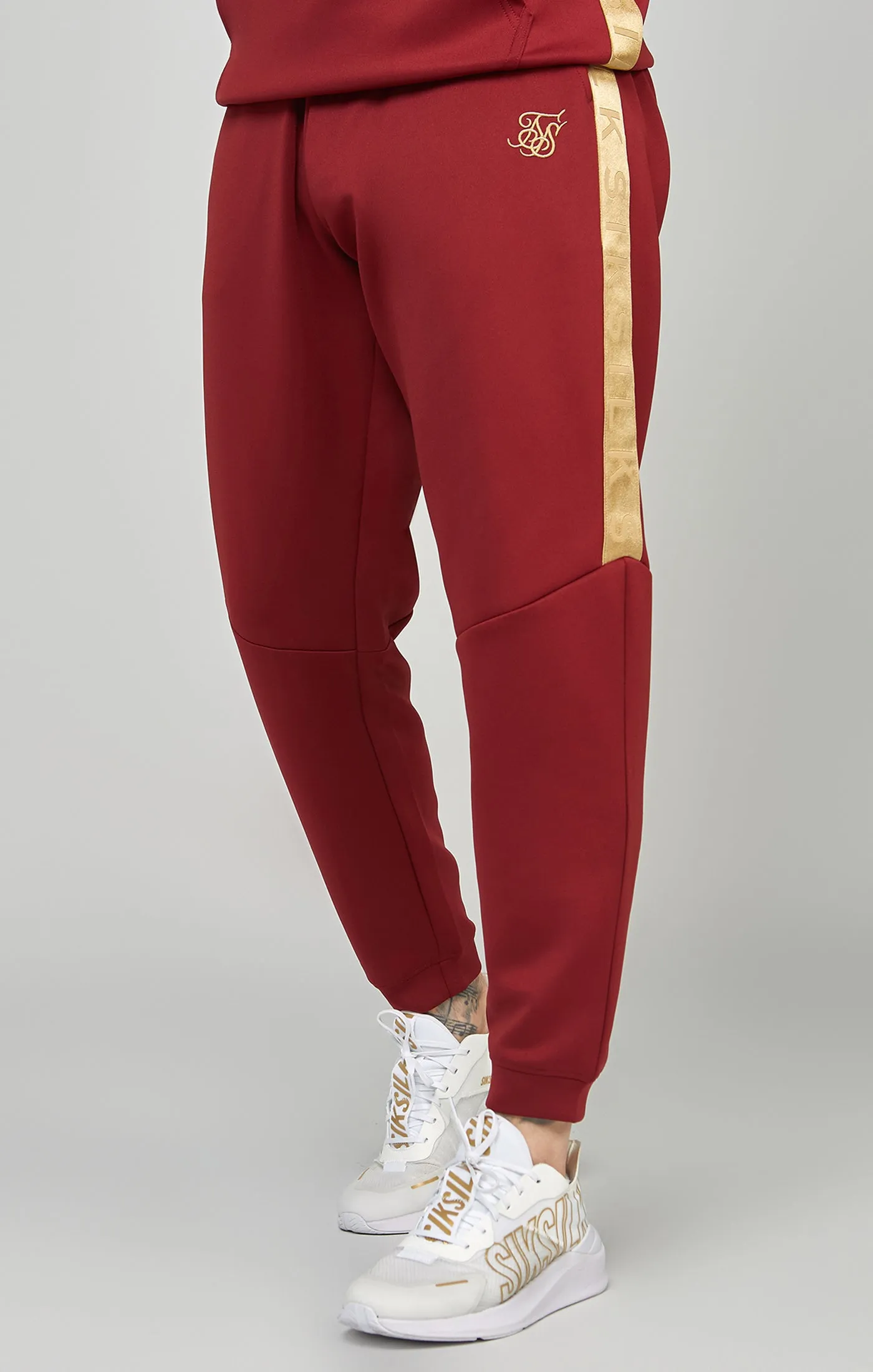 Gold Tape Jogger sold by Siksilk