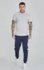 Navy Essentials Poly Track Pants sold by Siksilk