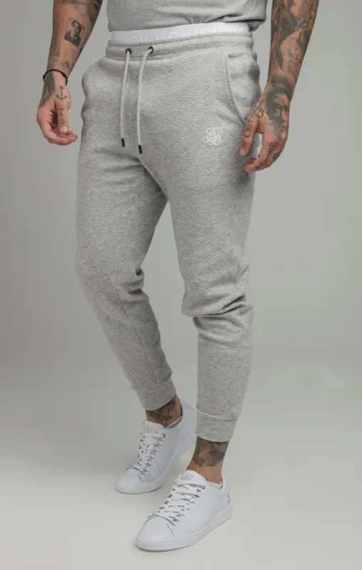 Grey Inset Taped Pant sold by Siksilk