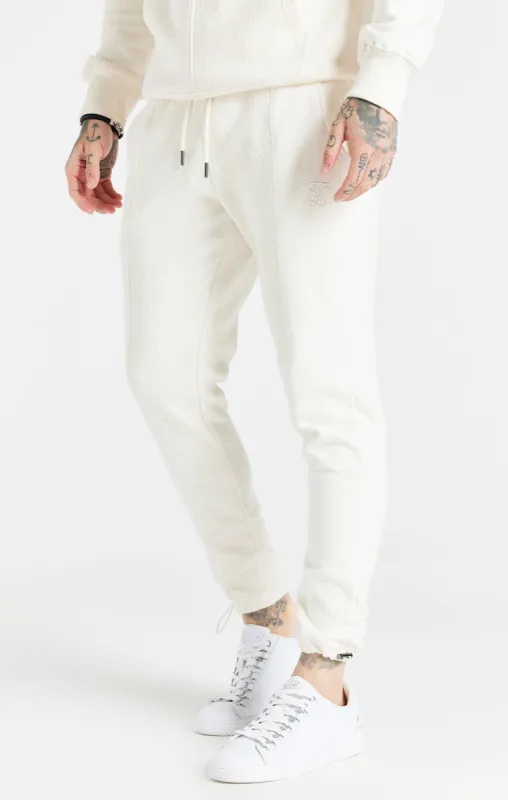 Ecru Half And Half Toggle Cuff Pant sold by Siksilk