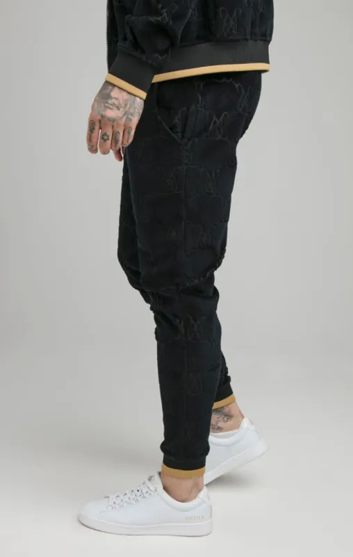 Black Devore Velvet Jogger sold by Siksilk