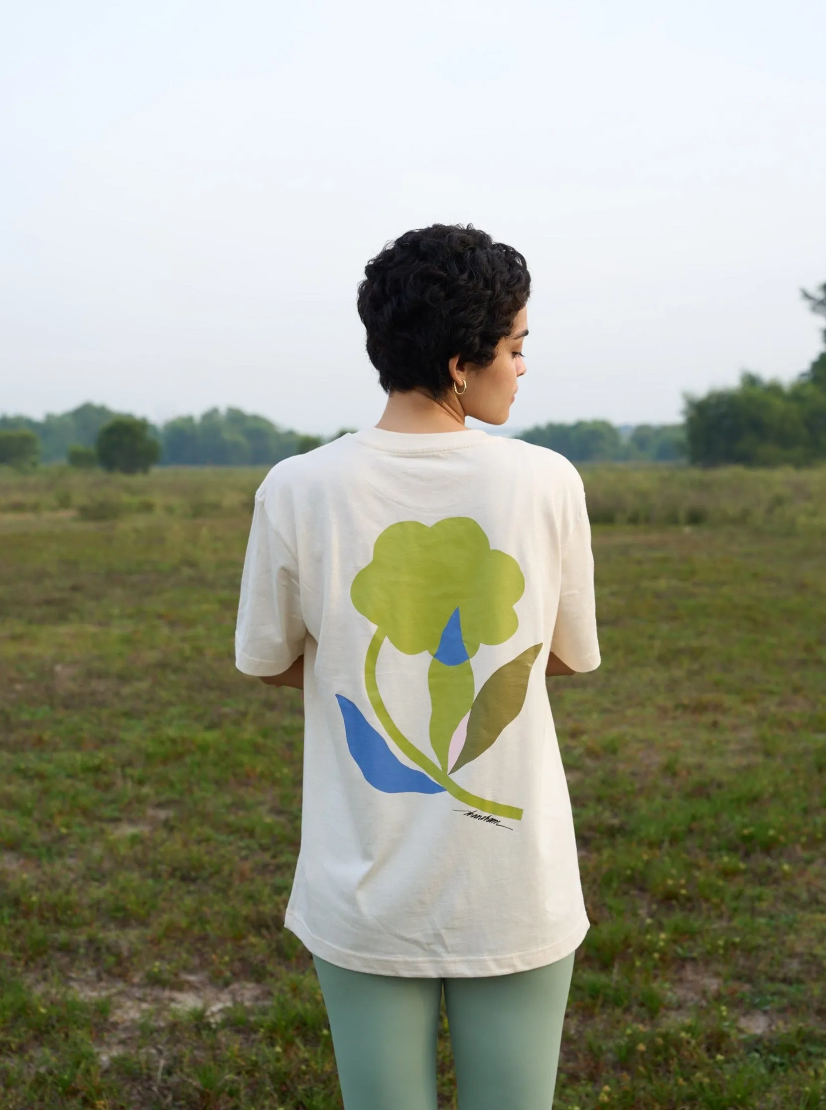 Friend of Earth Tee sold by Earthkind