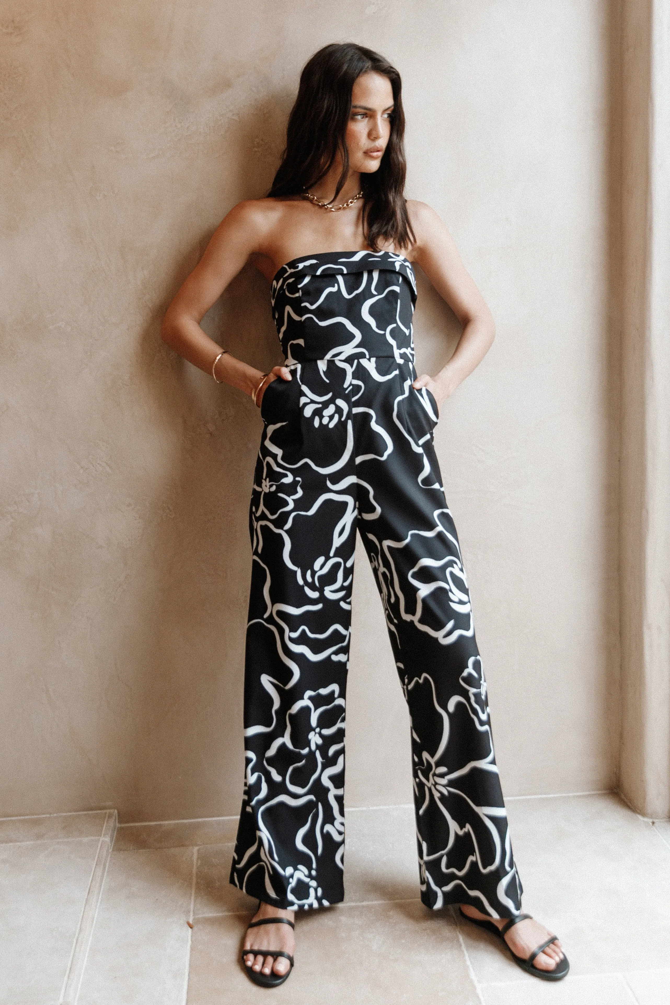 York Jumpsuit - White/Black Floral sold by Petal & Pup
