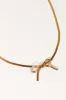 Lydia Bow Necklace - Gold sold by Petal & Pup