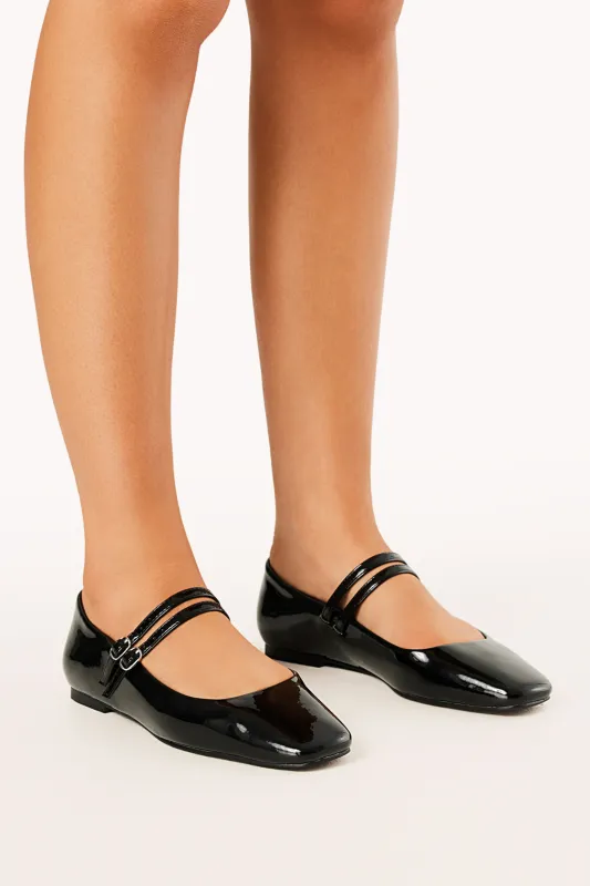 Finnegan Flats - Black Patent sold by Petal & Pup