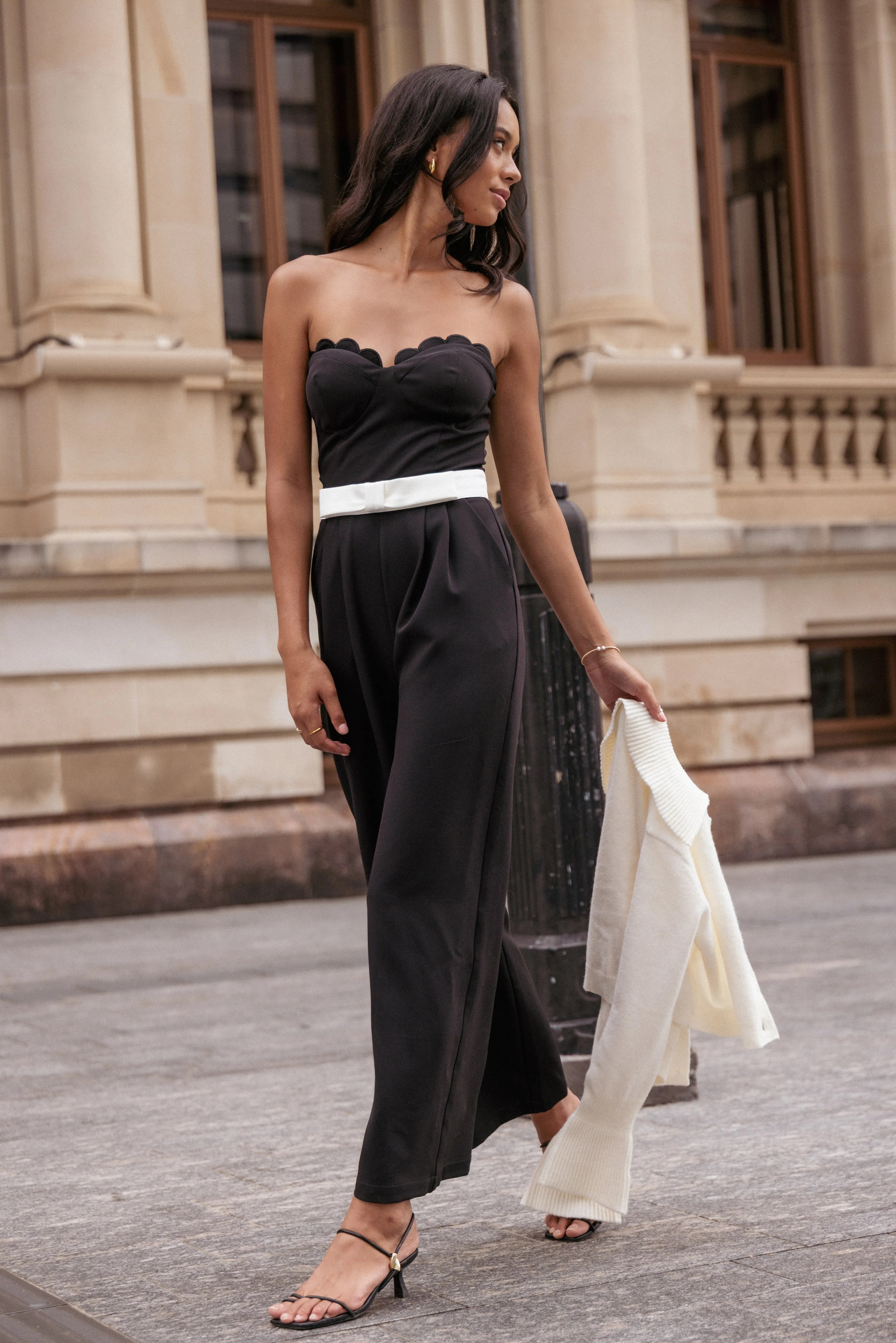 Elaria Scalloped Belted Jumpsuit - Black sold by Petal & Pup