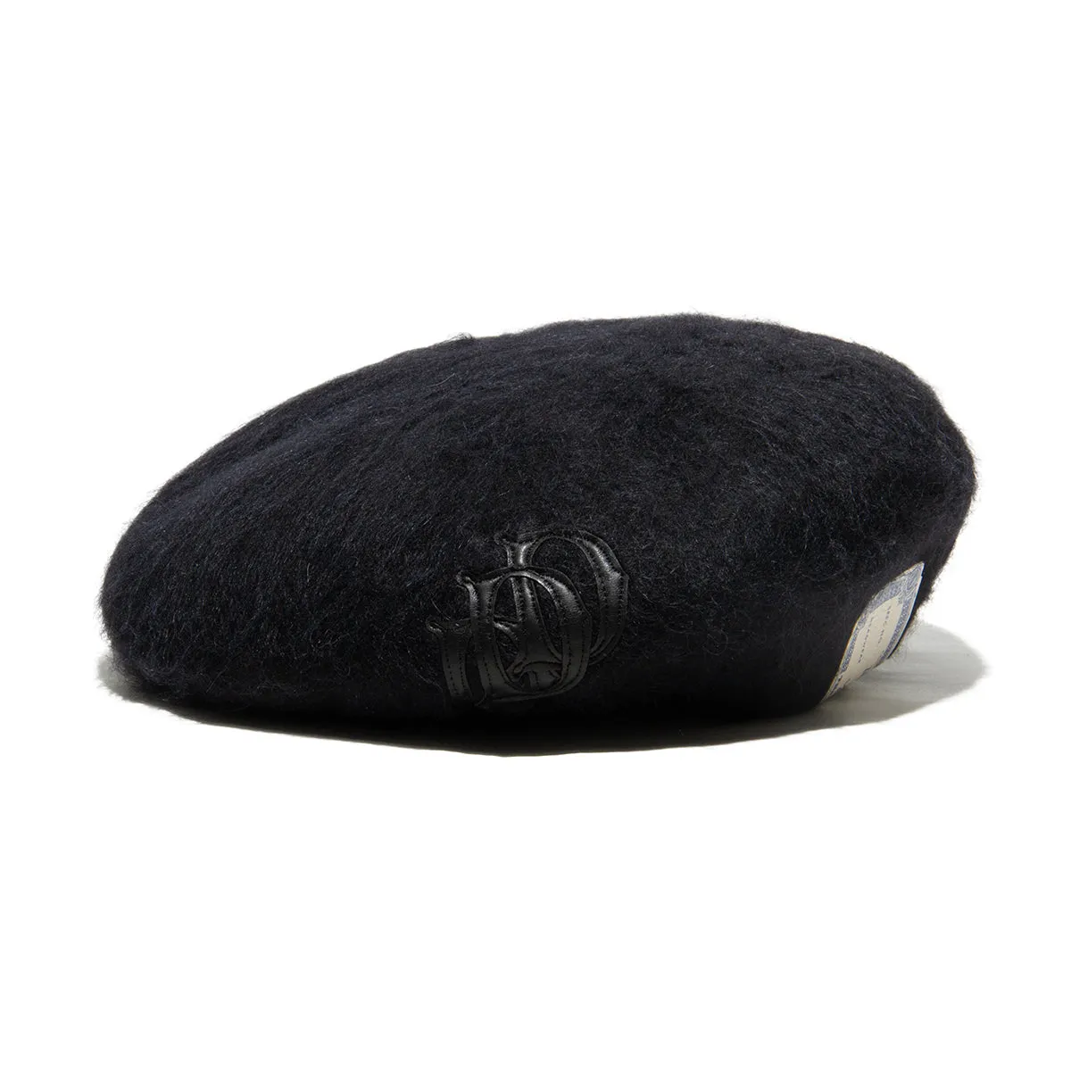 LEATHER WAPPEN FLUFFY BERET - Black sold by H.W. Dog & Co