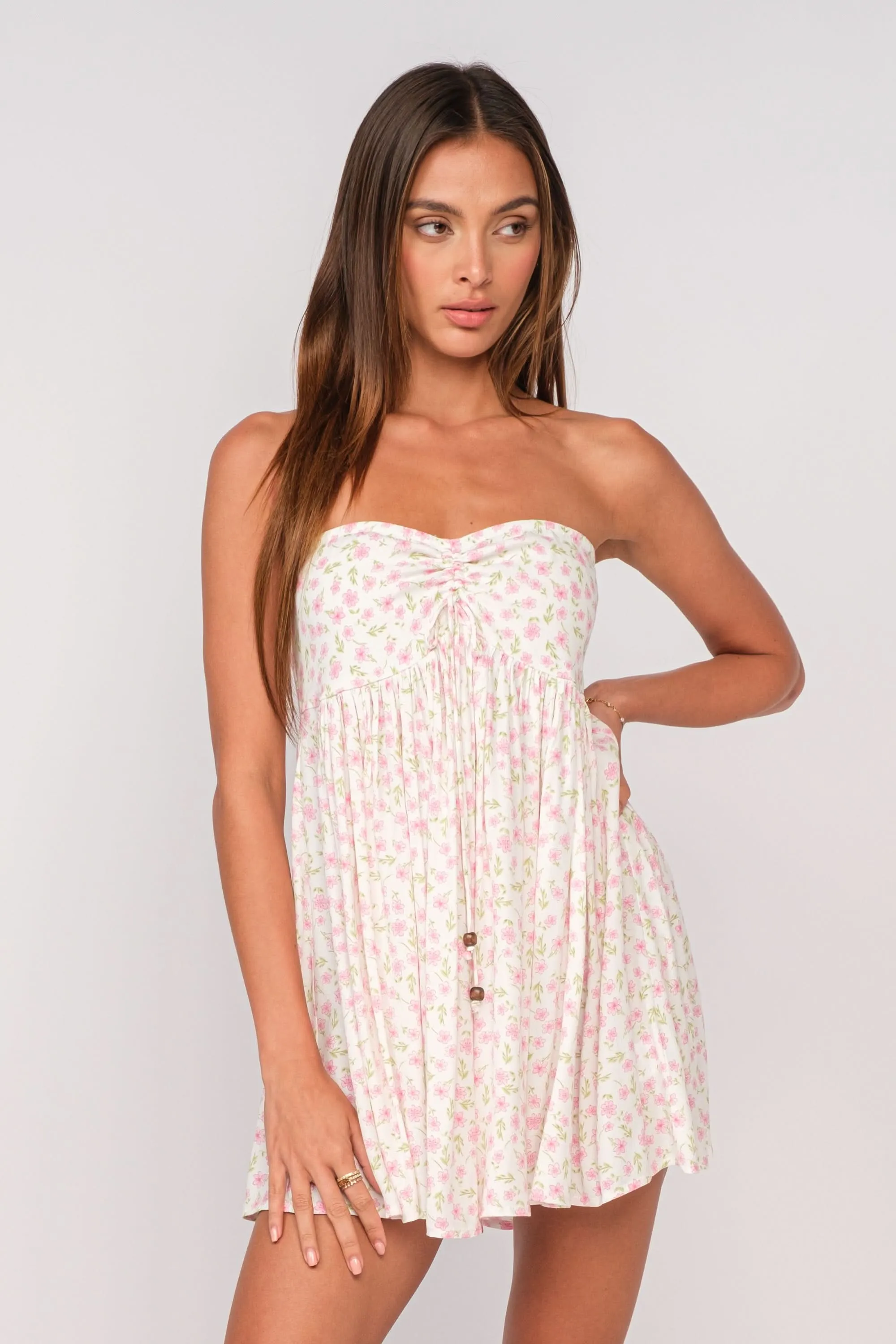 Lena White and Pink Floral Print Strapless Mini Dress sold by Boho Pink