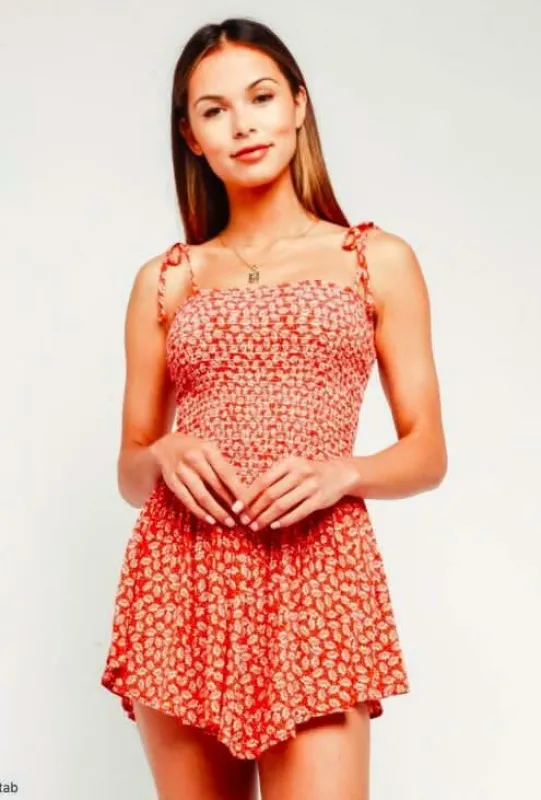 Monika Orange Leaf Print Smocked Romper sold by Boho Pink
