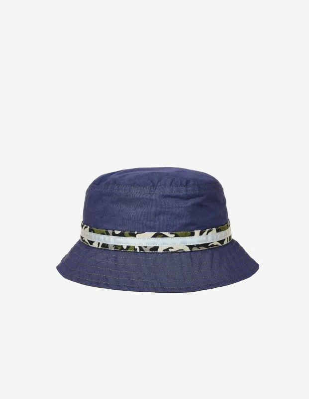 7396 Reversible Bucket Hat Black/Blue sold by Maharishi
