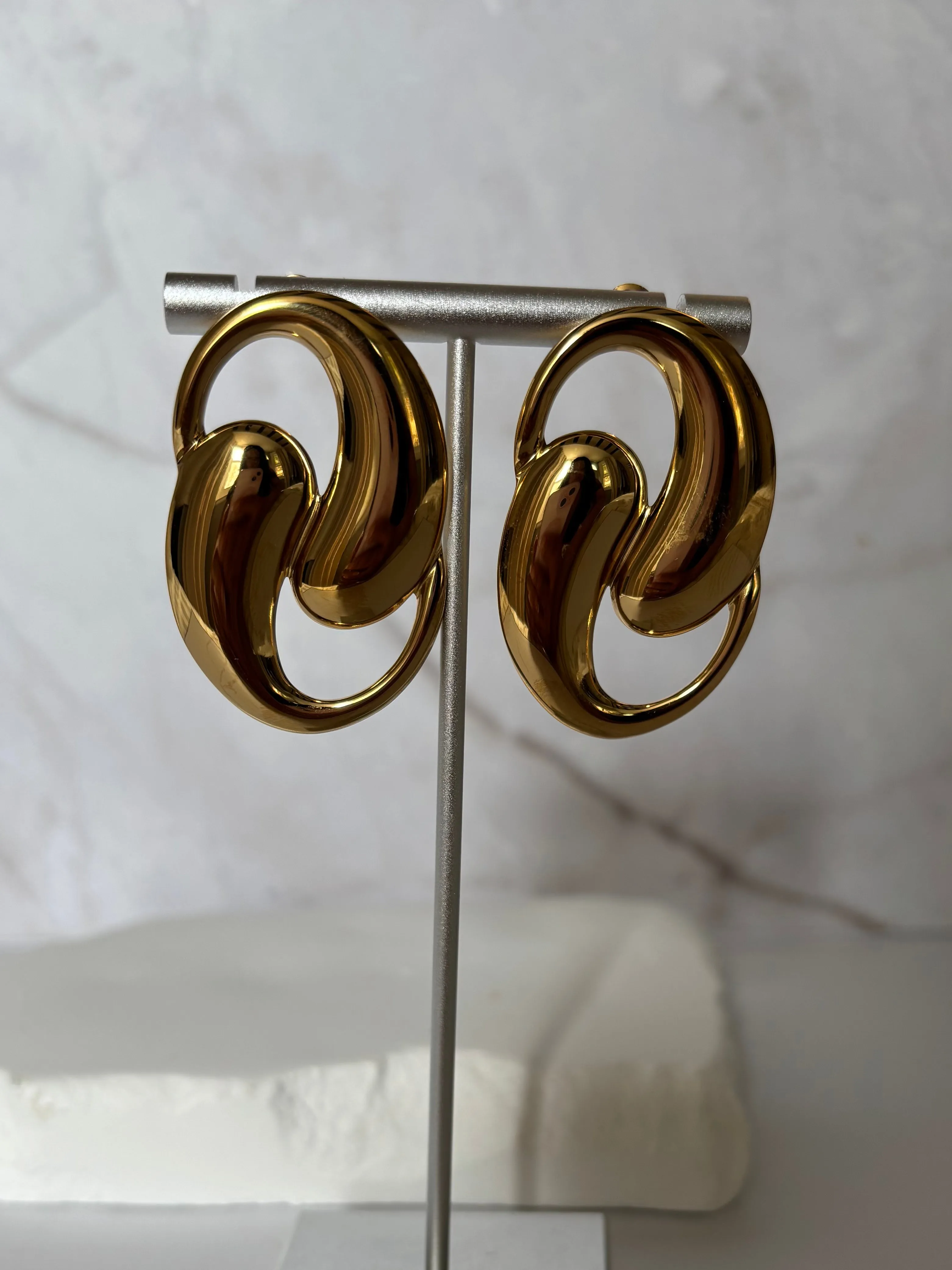 Twisted waterdrop earrings sold by Rareify02