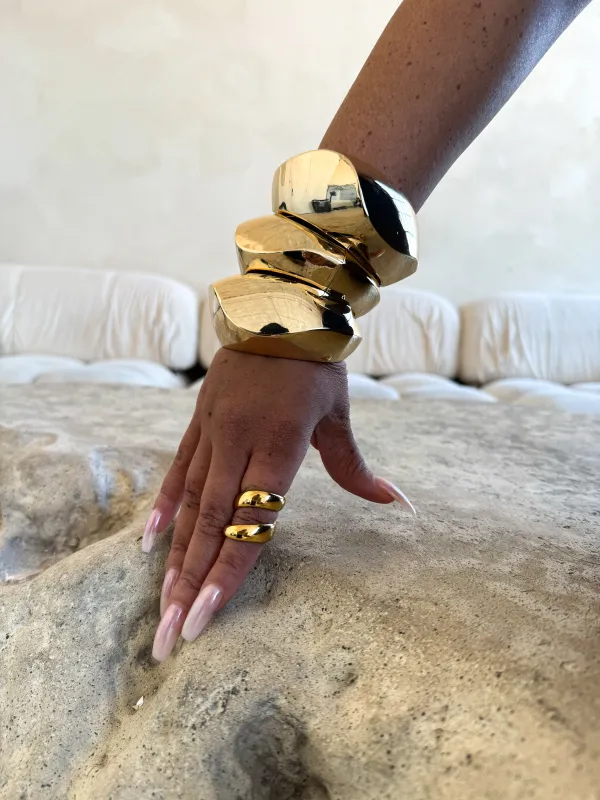 Gold motion bangle sold by Rareify02