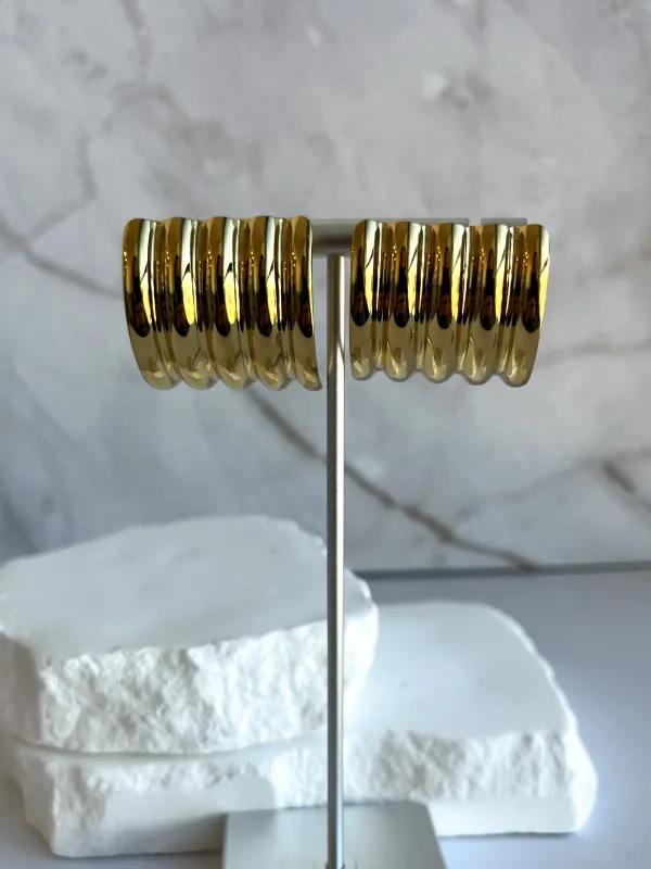 Vintage ribbed earrings sold by Rareify02