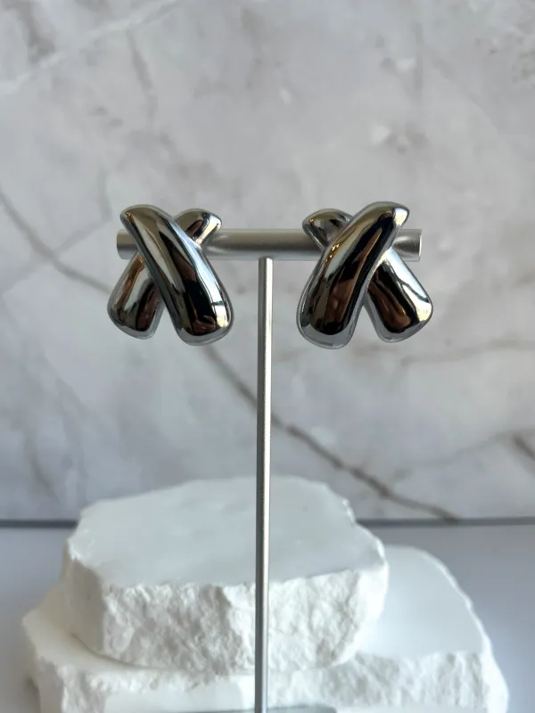 Chrome xoxo earrings sold by Rareify02