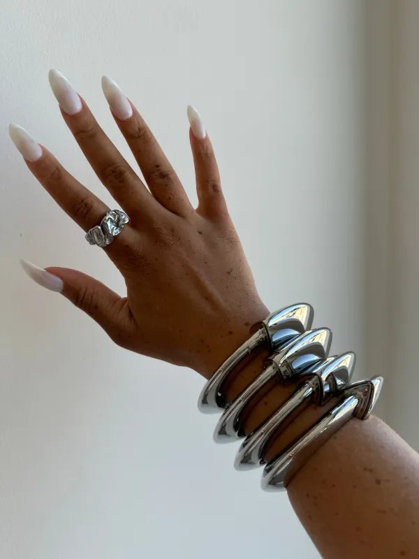 Chrome clasp bangle sold by Rareify02