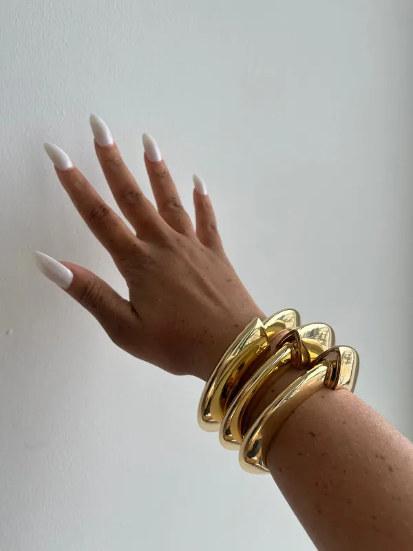 Gold clasp bangle sold by Rareify02