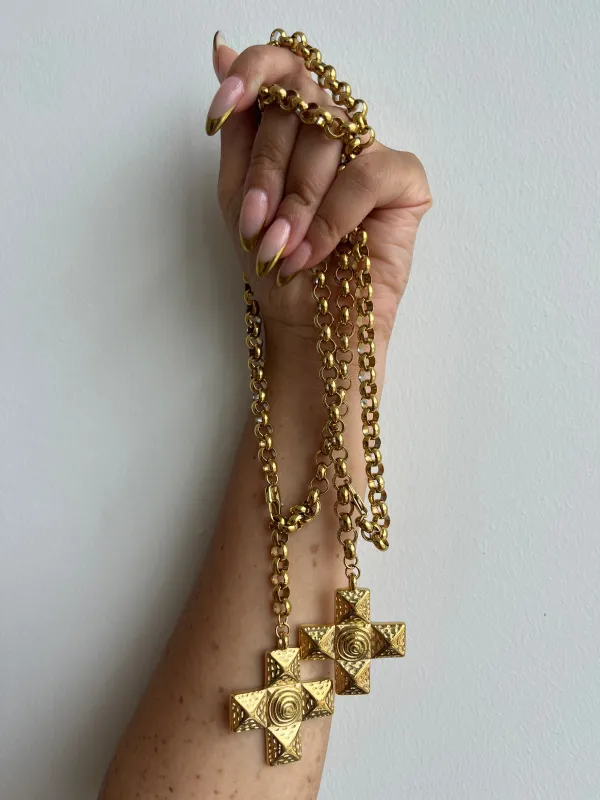 Gold swirl cross sold by Rareify02