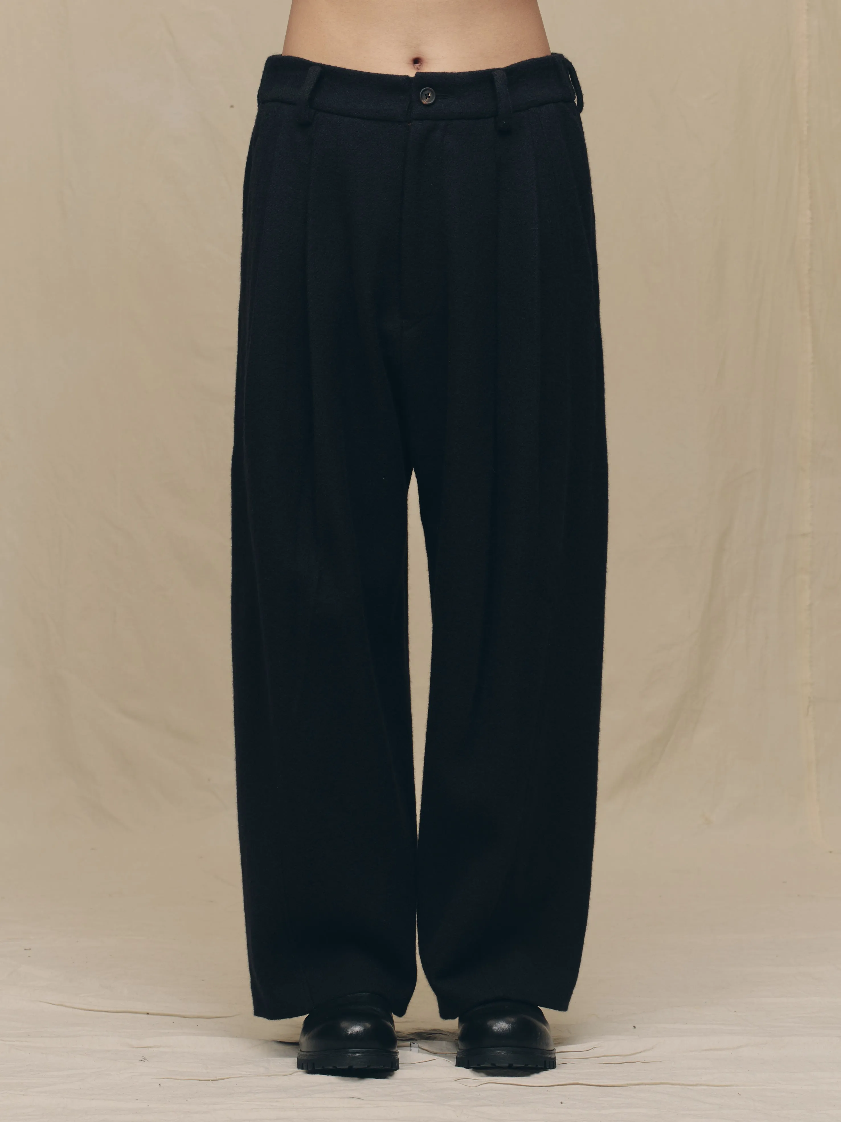 PLEATED DROP CROTCH TROUSERS sold by ziggy chen