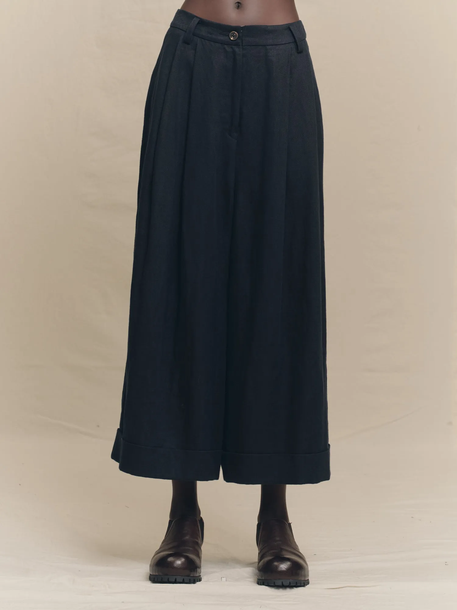 FRONT PLEATED CROPPED TROUSERS sold by ziggy chen