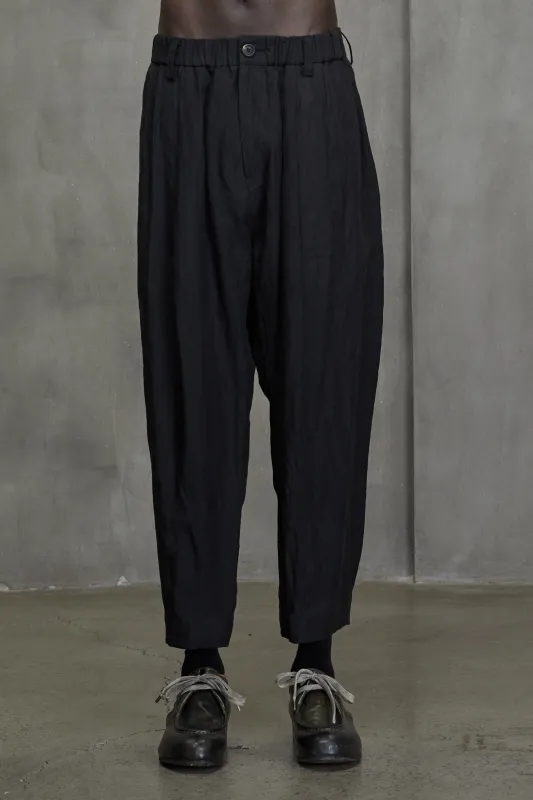 PLEATED TAPERED CUT TROUSERS sold by ziggy chen