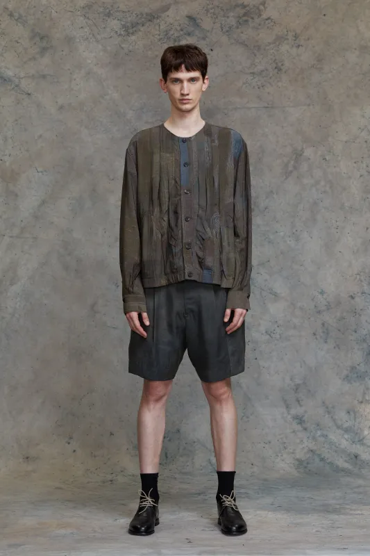 MULTIPLE PLEATED COLLARLESS TOP sold by ziggy chen