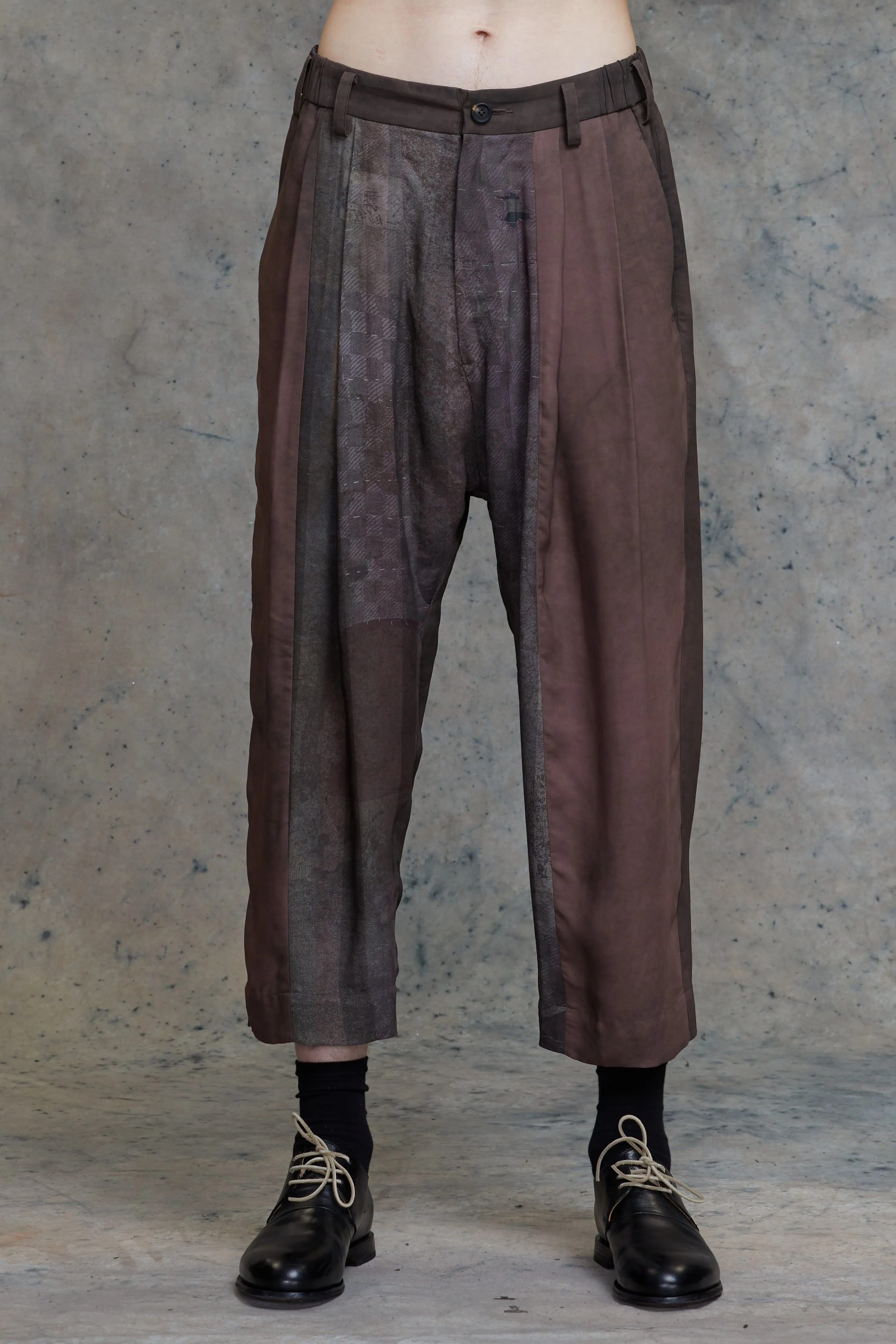 PLEATED DROP-CROTCHED TROUSERS sold by ziggy chen