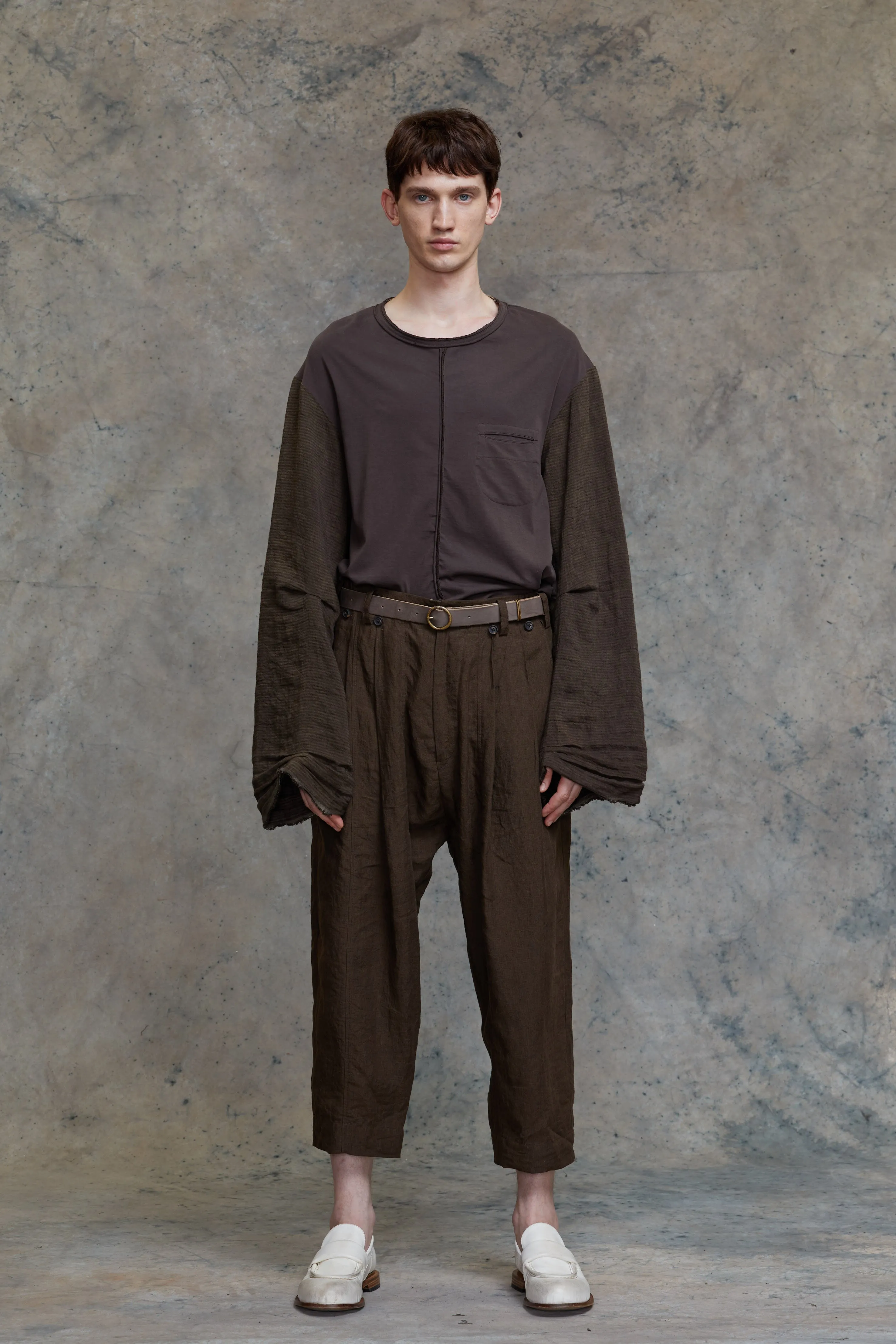 PLEATED DROP-CROTCH CROPPED TROUSERS sold by ziggy chen