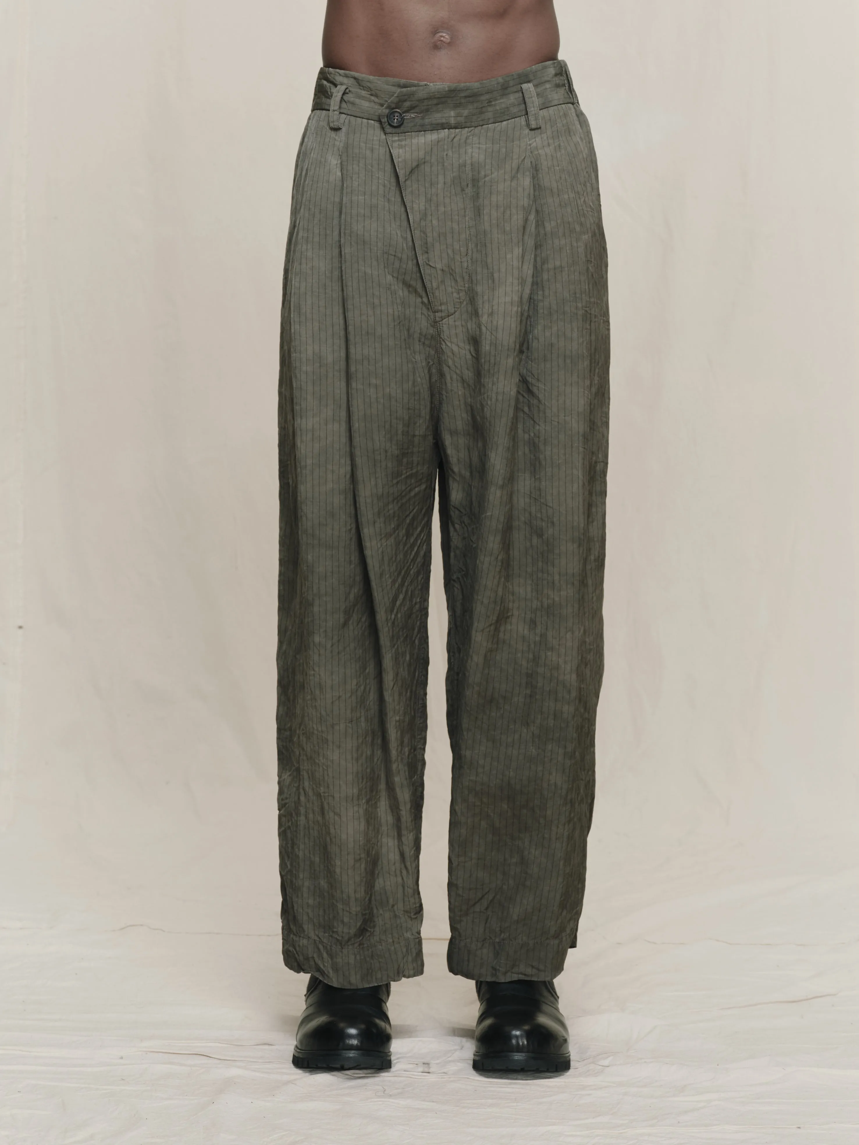 DROP-CROTCHED PLEATED TROUSERS sold by ziggy chen