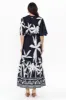 Lestelle Navy Palm Cotton Tie Dress sold by Blue Bungalow