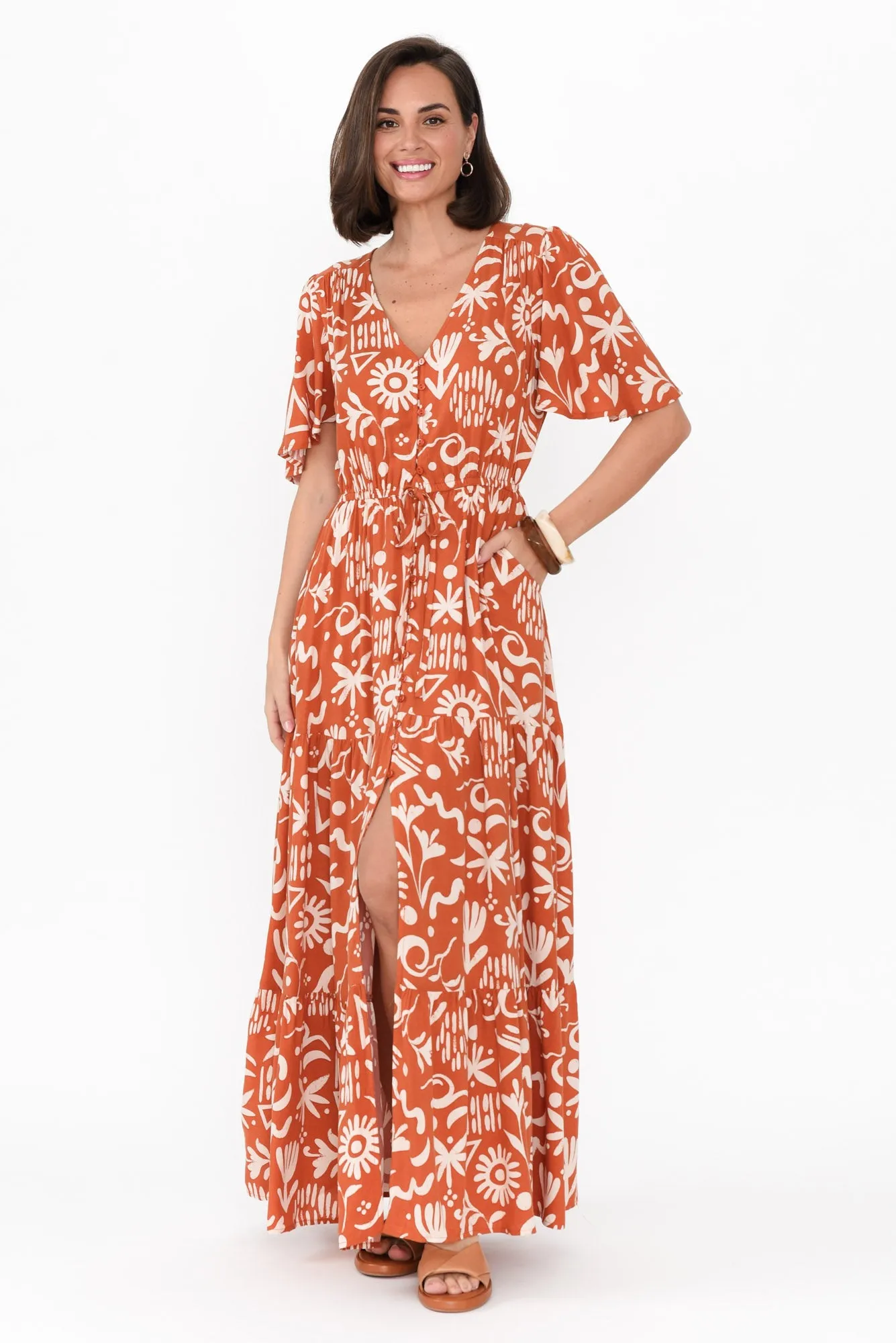 Barbara Rust Geo Flutter Sleeve Dress sold by Blue Bungalow