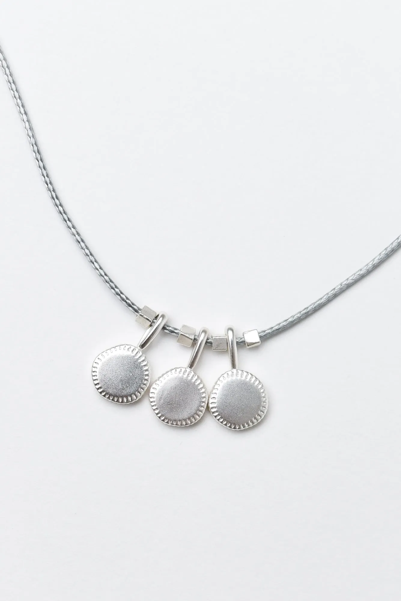Abeba Silver Disc Pendant Necklace sold by Blue Bungalow product image thumbnail 2