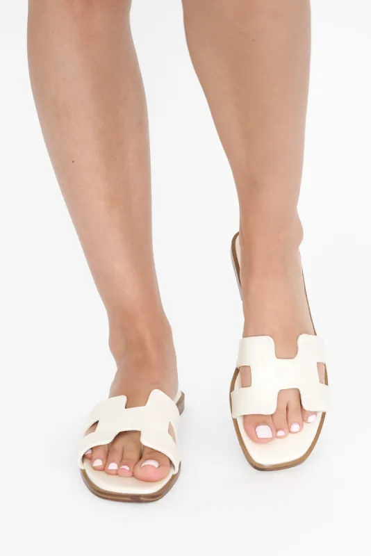 Hacette Ivory Cut Out Slide sold by Blue Bungalow