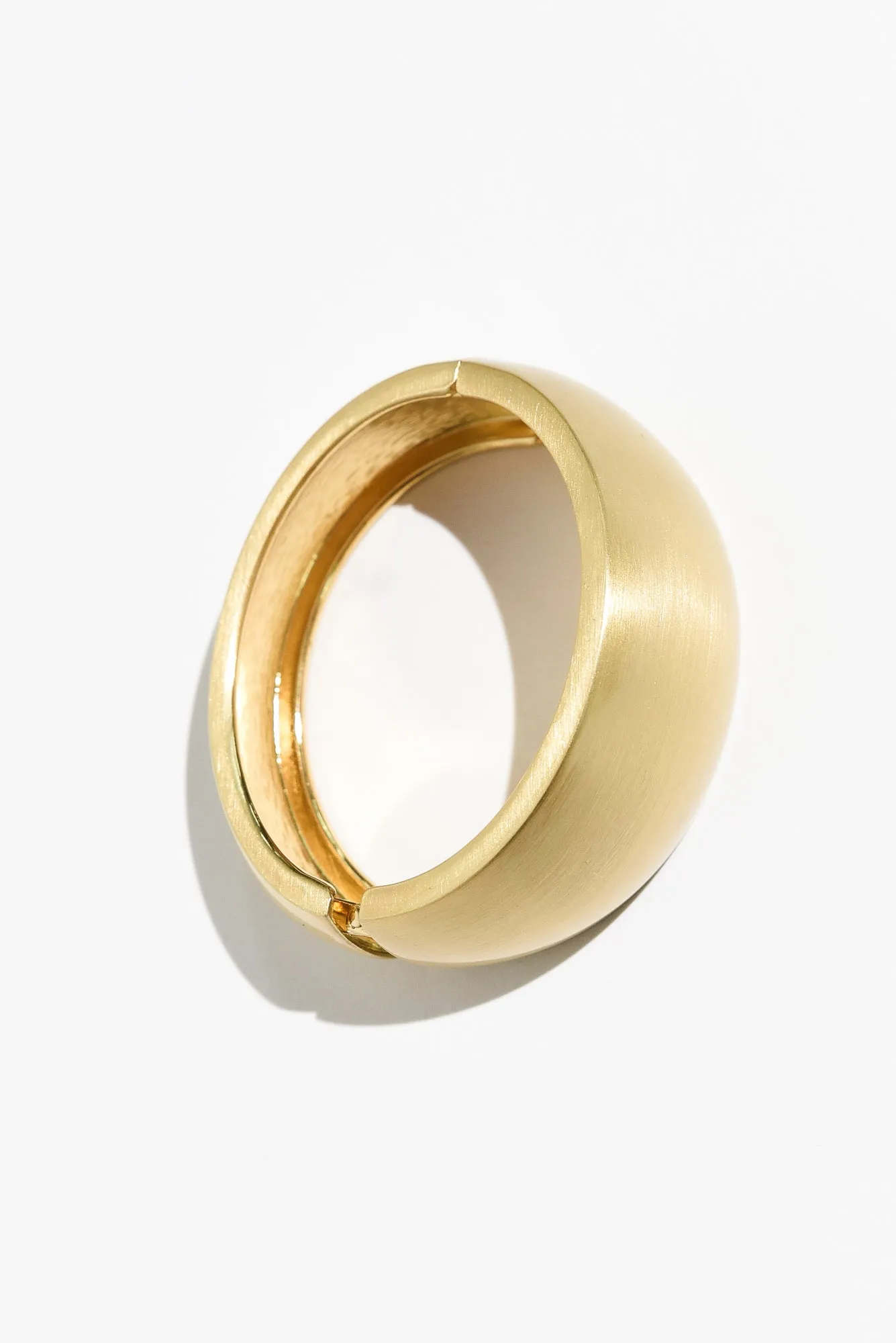 Morea Gold Hinge Bangle sold by Blue Bungalow