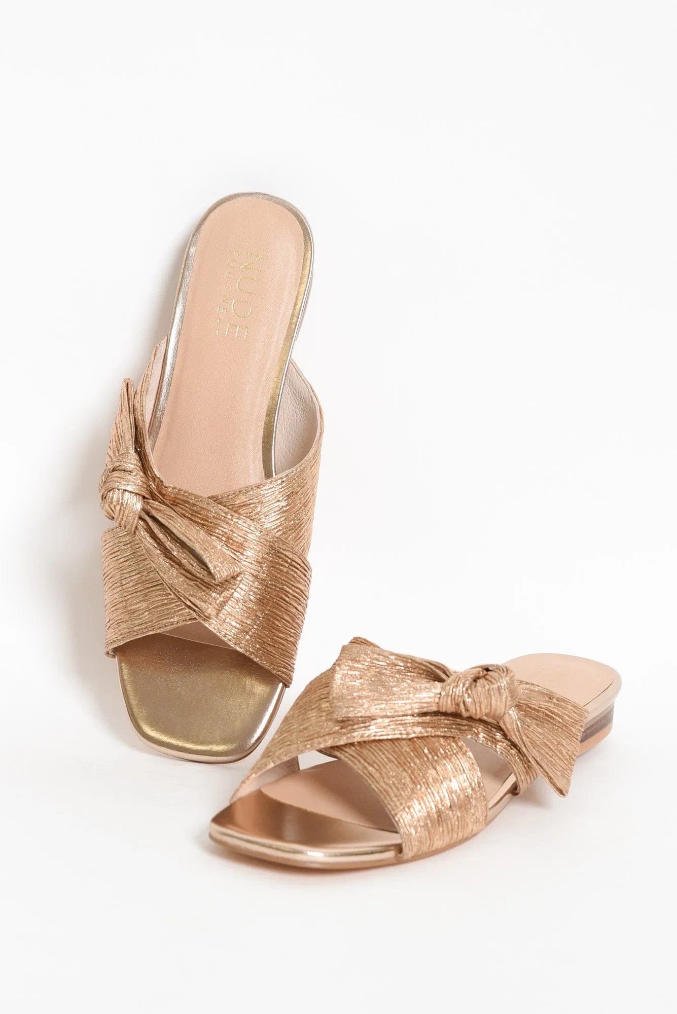 Olivia Melon Crossover Slide sold by Blue Bungalow