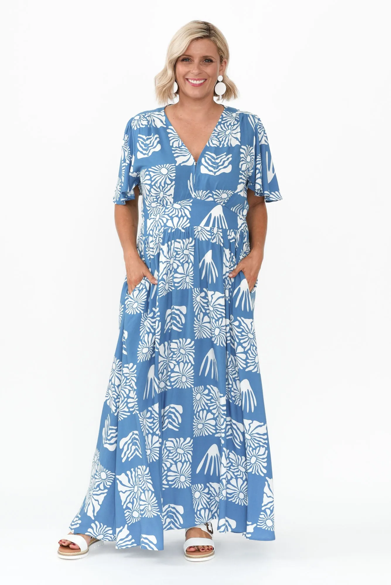 Ora Blue Floral Flutter Sleeve Dress sold by Blue Bungalow