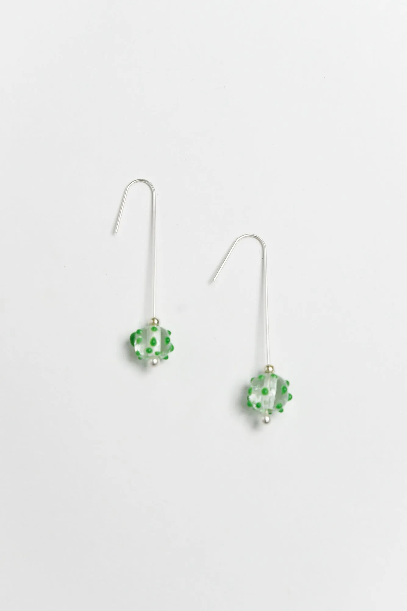 Anka Green Dot Glass Hook Earrings sold by Blue Bungalow