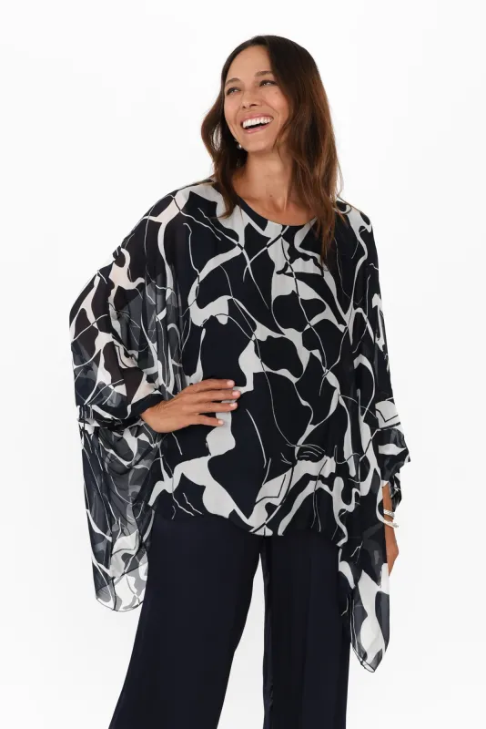 Trevino Navy Marble Silk Overlay Top sold by Blue Bungalow