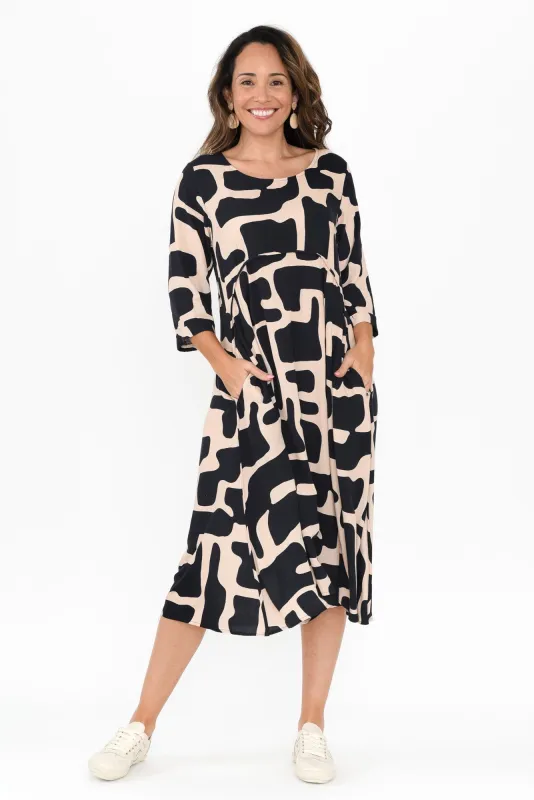 Zaelia Dark Navy Geo Sleeved Crescent Dress sold by Blue Bungalow