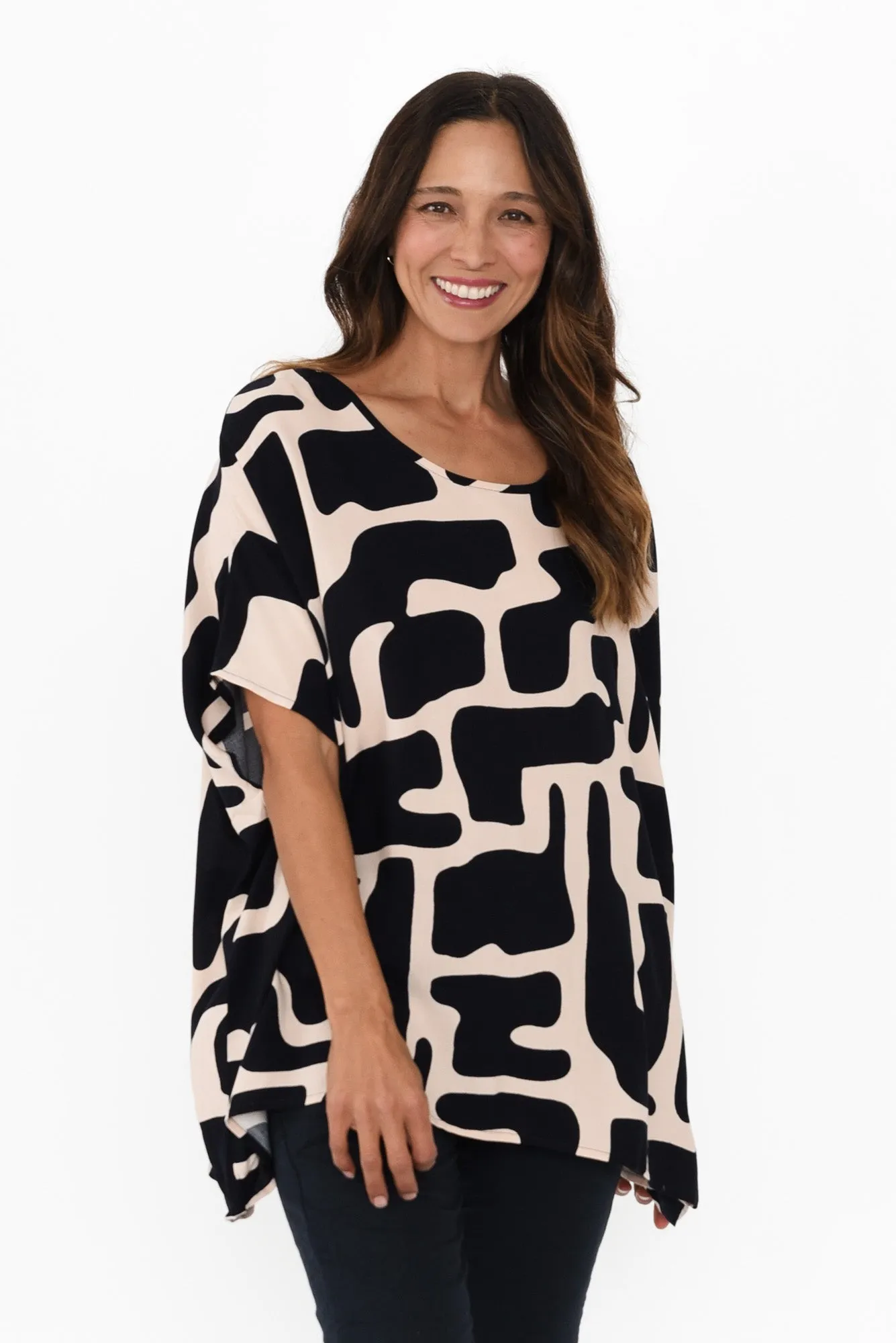 Arina Dark Navy Geo Drape Top sold by Blue Bungalow