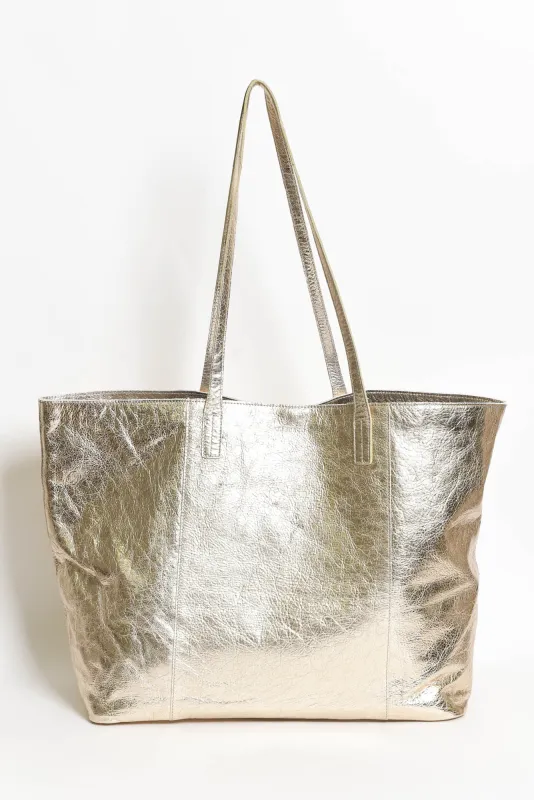 Elara Champagne Metallic Tote Bag sold by Blue Bungalow