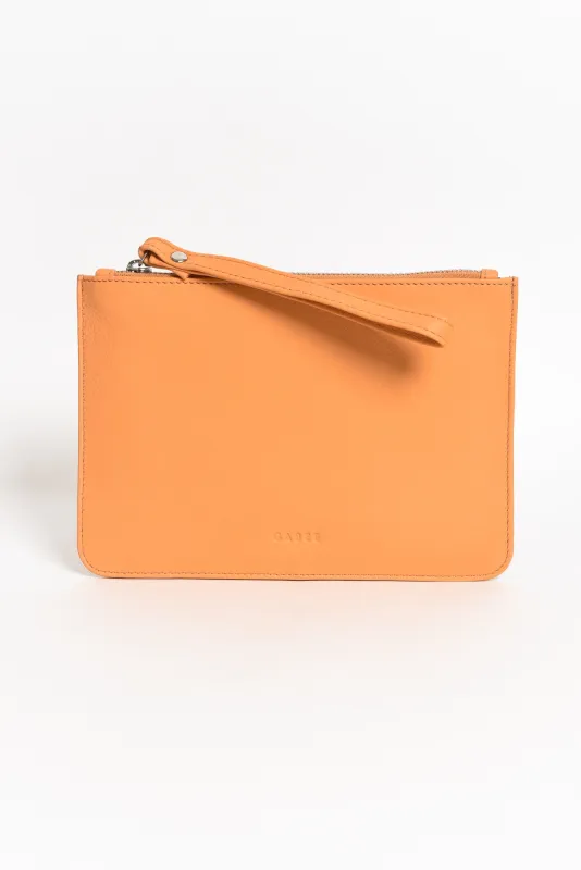 Queens Apricot Leather Clutch sold by Blue Bungalow