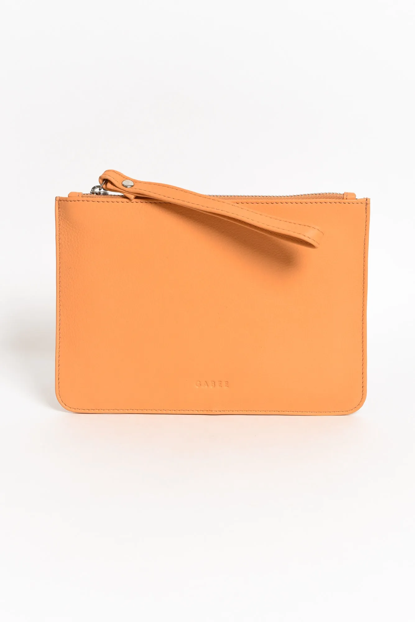 Queens Apricot Leather Clutch sold by Blue Bungalow