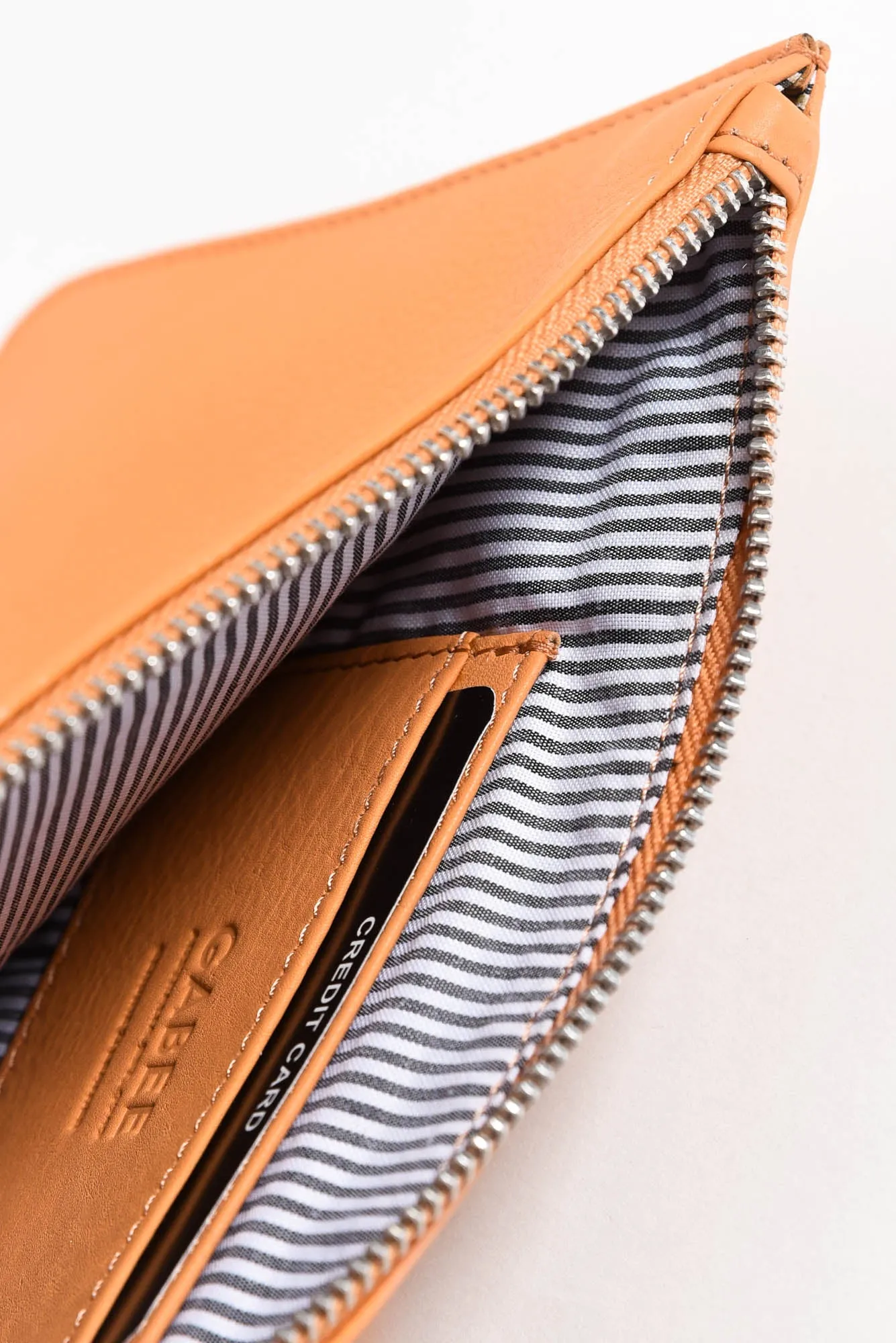 Queens Apricot Leather Clutch sold by Blue Bungalow product image thumbnail 2