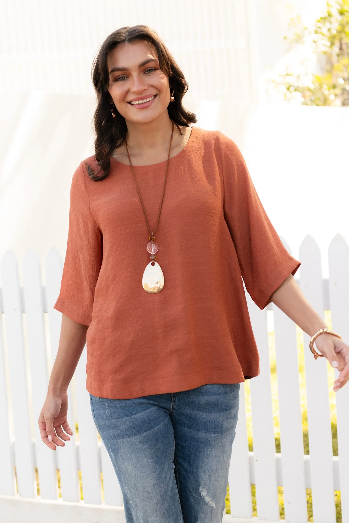 Selena Rust 3/4 Sleeve Top sold by Blue Bungalow