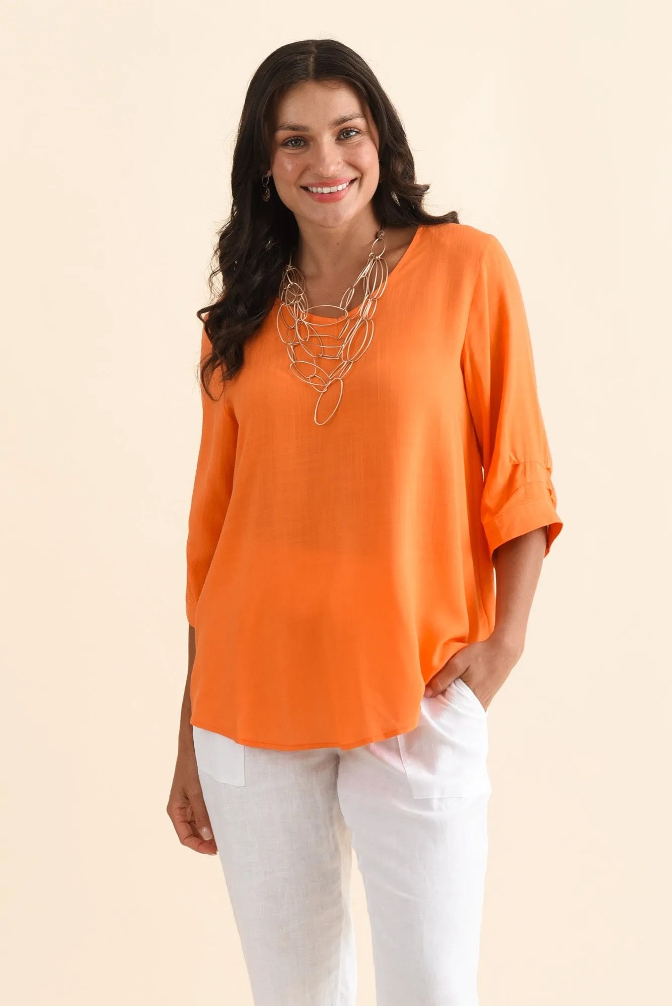 Gomez Orange Button Top sold by Blue Bungalow