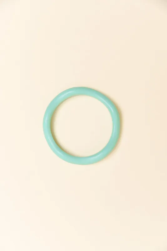 Lia Aqua Resin Wave Bangle sold by Blue Bungalow