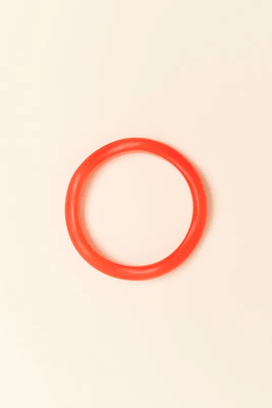 Lia Orange Resin Wave Bangle sold by Blue Bungalow