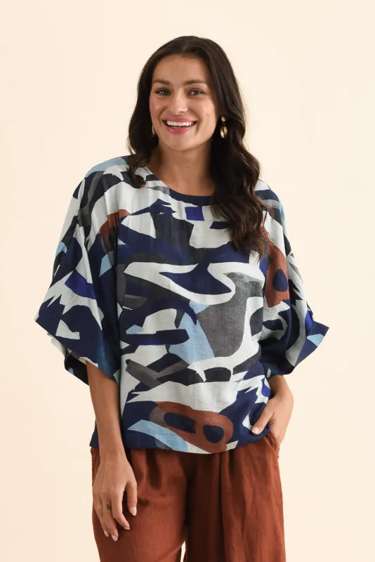Emilee Blue Abstract Drape Top sold by Blue Bungalow