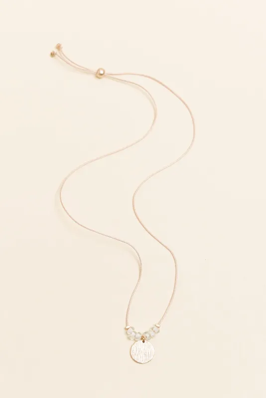 Sara Clear Beaded Disc Necklace sold by Blue Bungalow