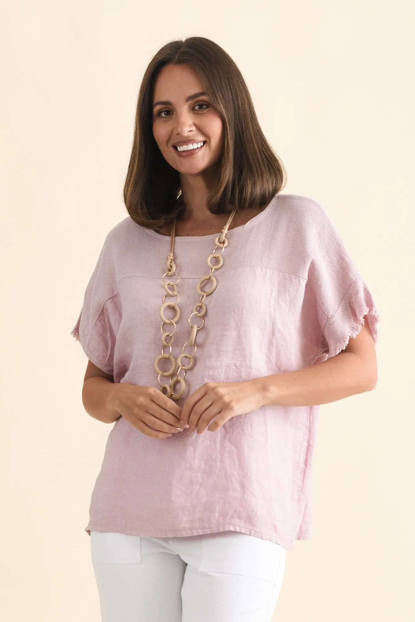 Remo Pink Linen Frayed Top sold by Blue Bungalow